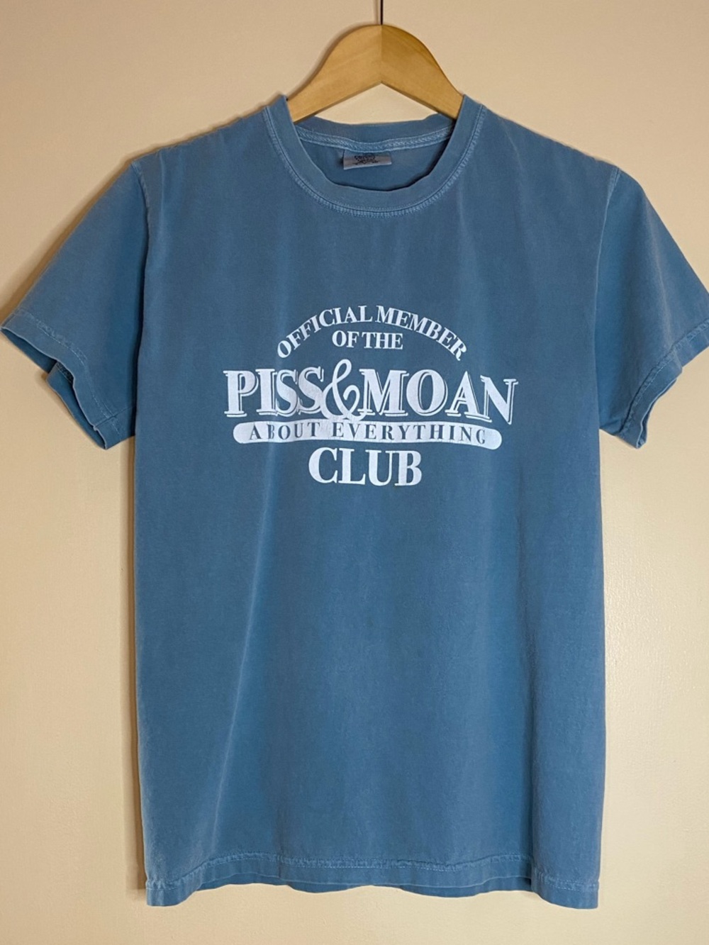 Comfort Colors Graphic Tee “Piss & Moan About Everything Club”, Washed Blue, S